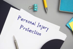 personal Injury protection with phrase on the piece of paper
